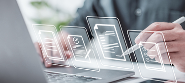 An employee using a stylus to interact with projected icons